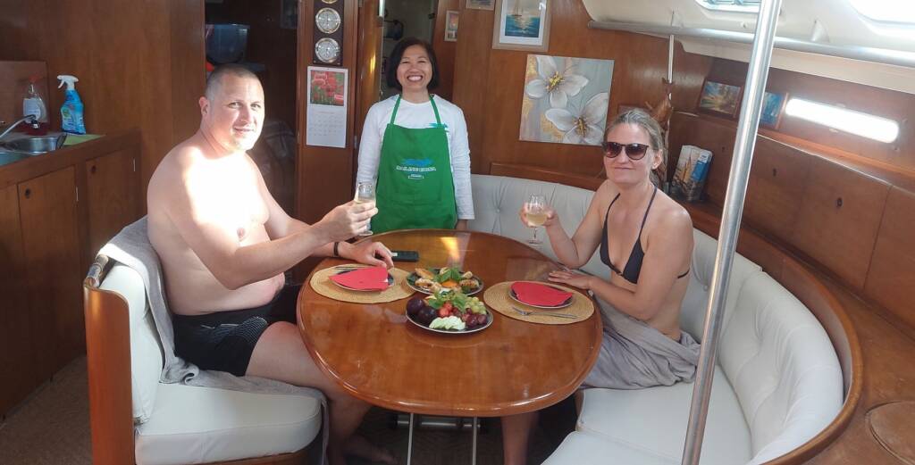 Sunset Vietnamese artisan snacks & fresh fruits onboard Sailing Edisa with the chef.